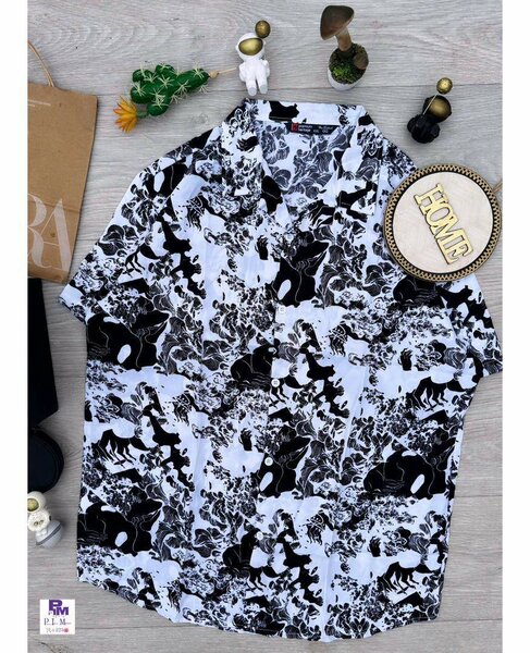 Chemise à motifs noirs et blancs