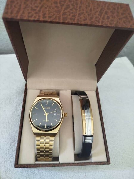 Montre Casio et coffret et bra