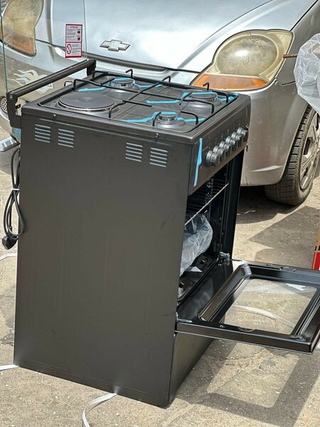 Volcano 2 electric and 2 gas burner stove with oven and gril