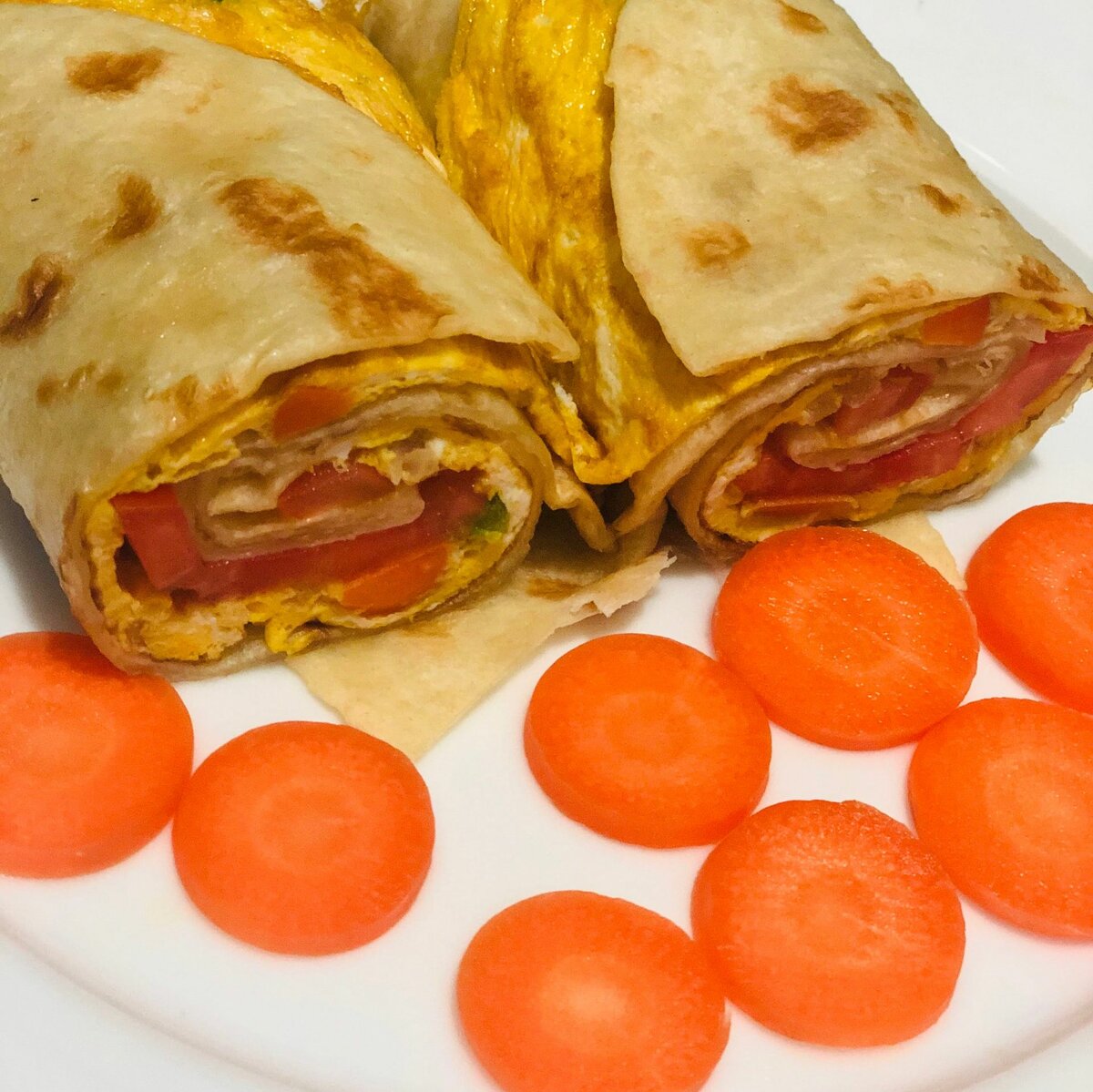 Chapati with eggs, sausage and fries