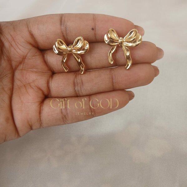 Boucles d'oreilles nœud dorées