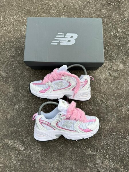 Baskets New Balance roses