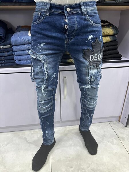 Jeans déchirés tendance homme