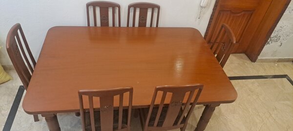 Wooden Dining table with six chairs