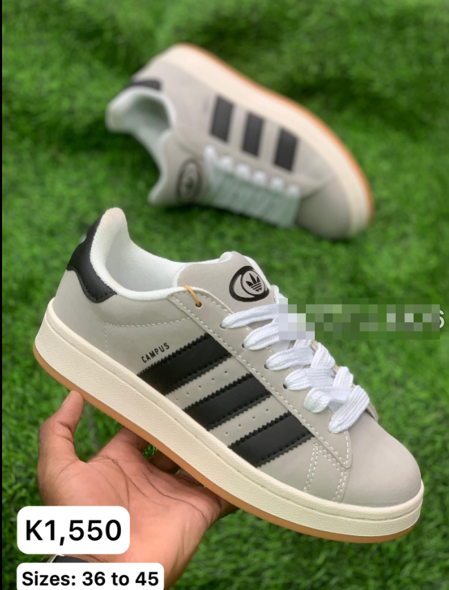 beige and black sneakers