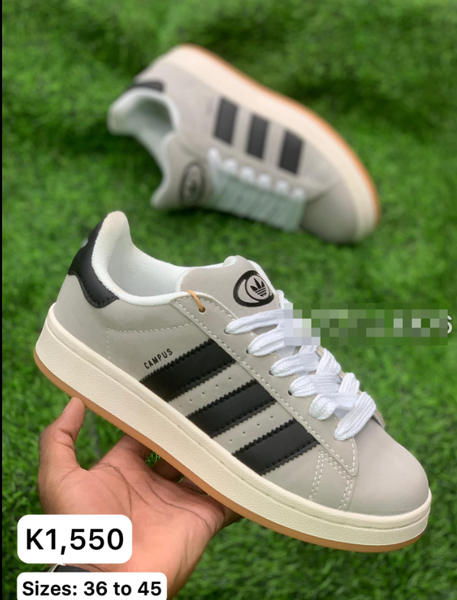 beige and black sneakers