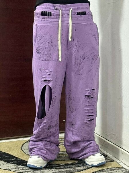 Jogging violet déchiré