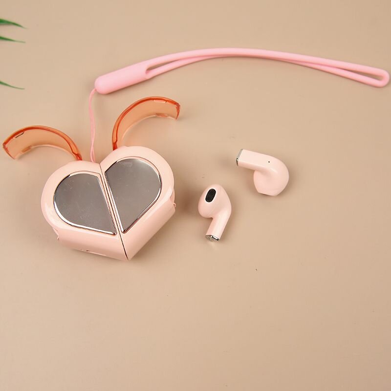 Écouteurs sans fil coeur rose