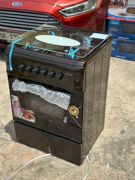 Volcano 2 electric and 2 gas burner stove with oven and gril