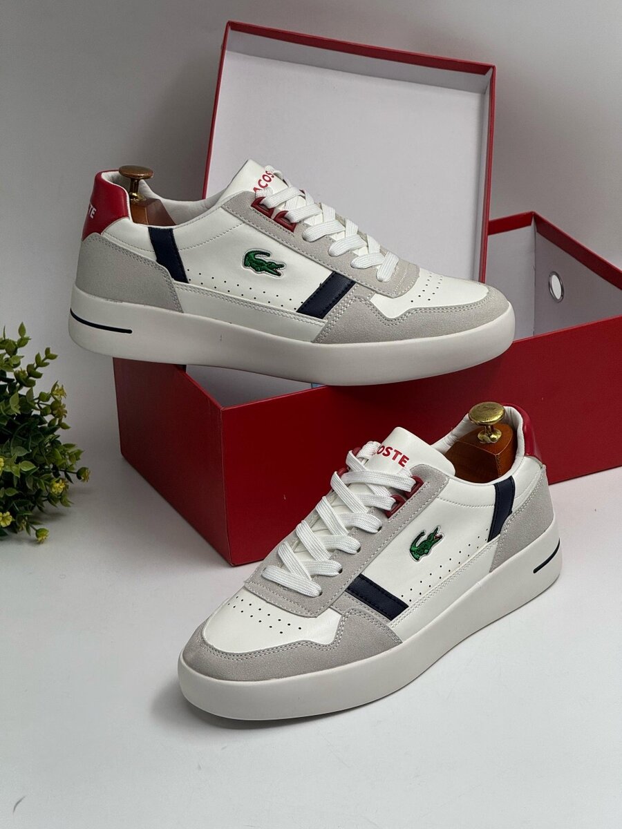 LACOSTE NAVY AND WHITE