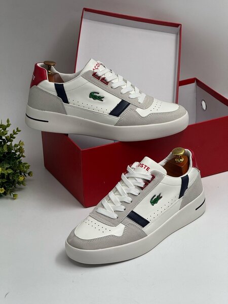 LACOSTE NAVY AND WHITE