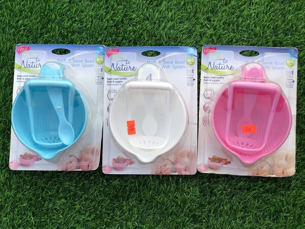 Mash and server bowl with spoon