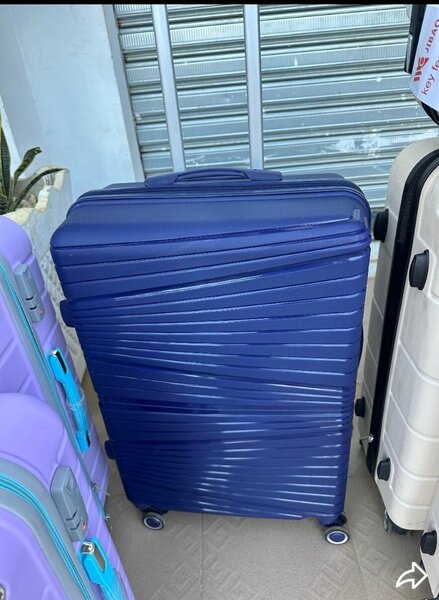 Valise rigide bleue 4 roues