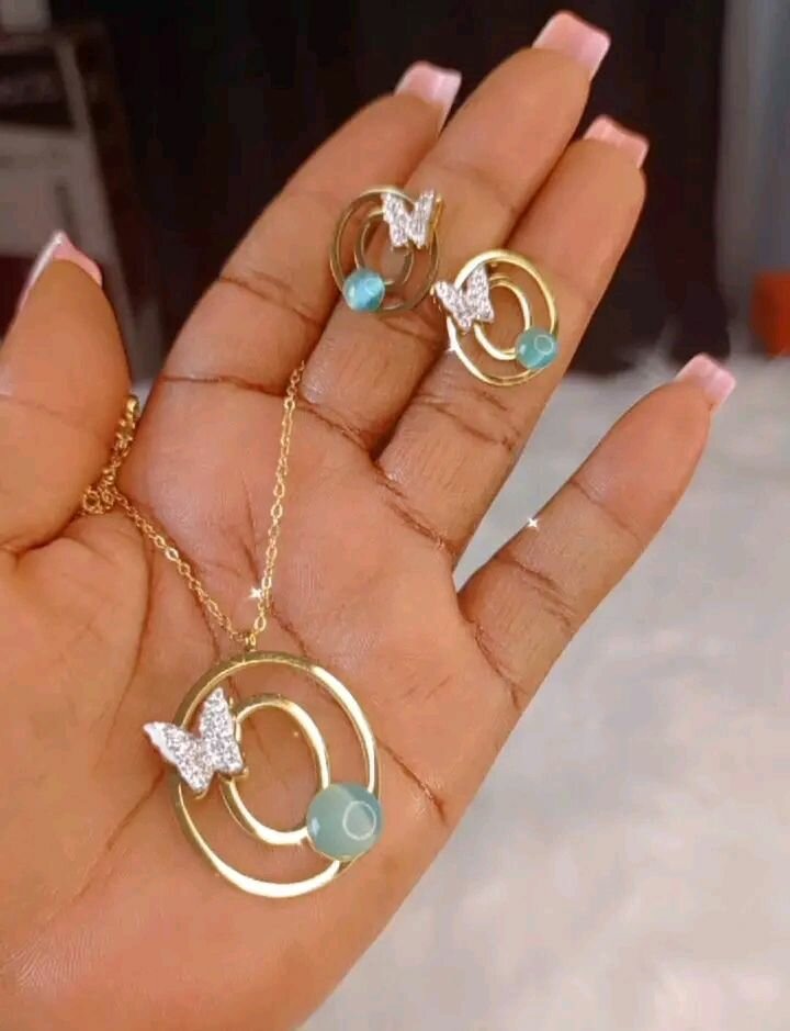 Élégant set bijoux papillon acier