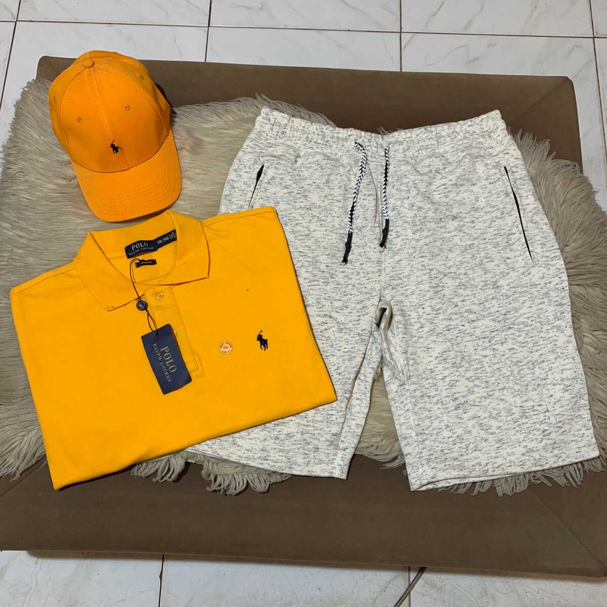 Cap, polo Lacoste and shorts