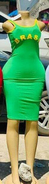 Beautiful and stylish women's dress with open shoulders green