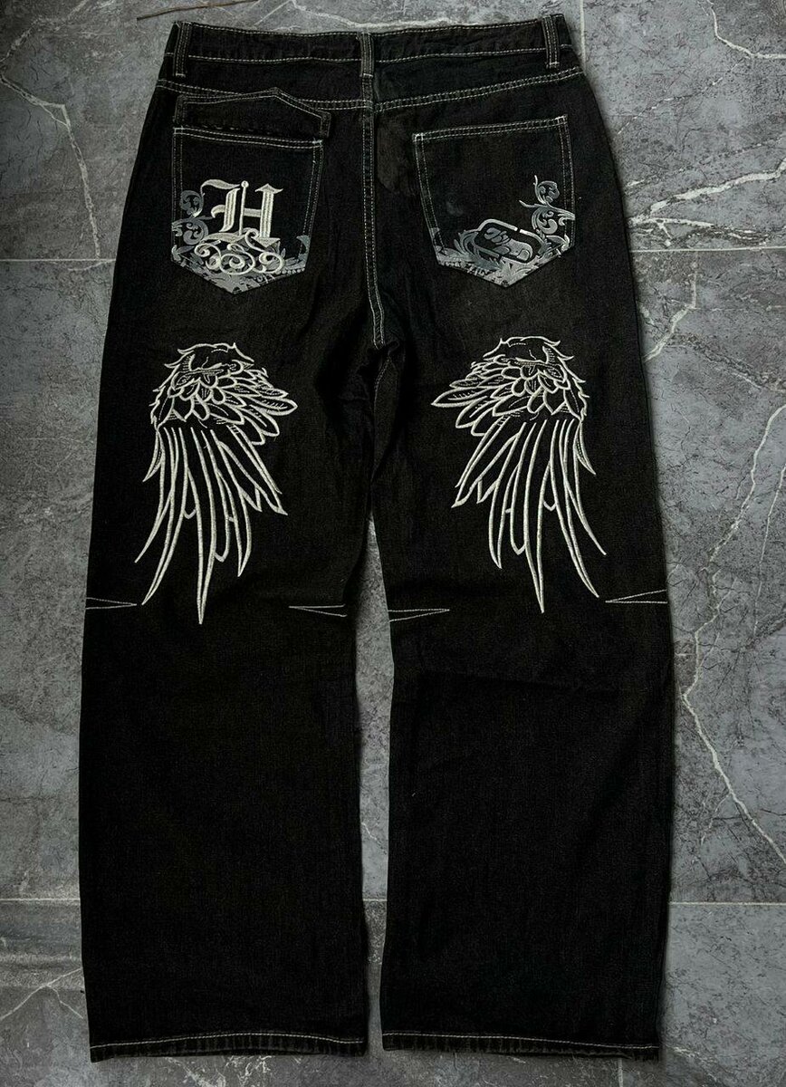 Jean noir avec ailes imprimées