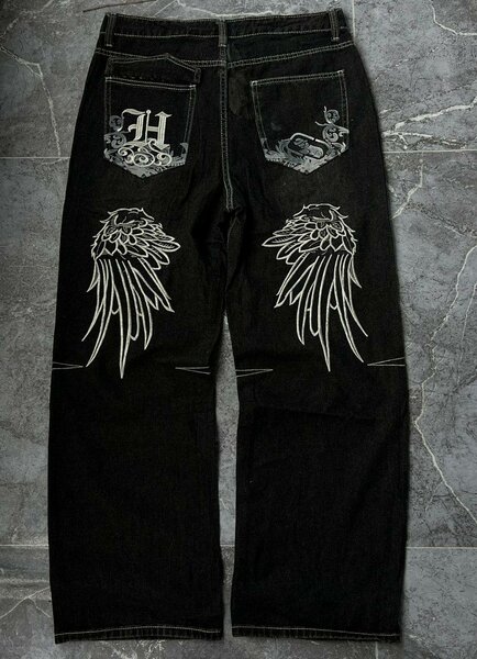 Jean noir avec ailes imprimées