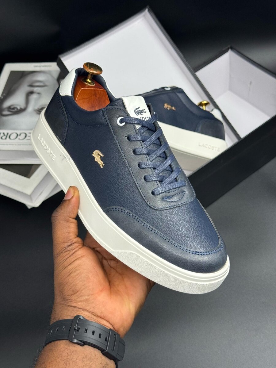 LACOSTE NAVY AND WHITE