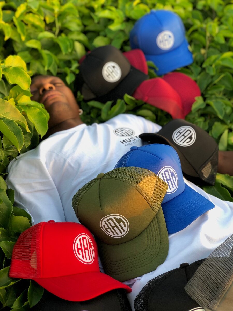 Hustle and Motivate caps k65