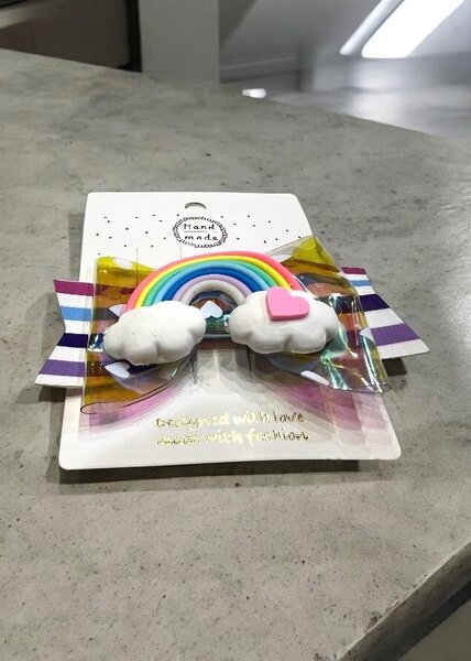 Rainbow style bow hair pins for kids.