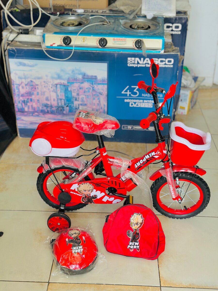 Vélo enfant rouge avec accessoires
