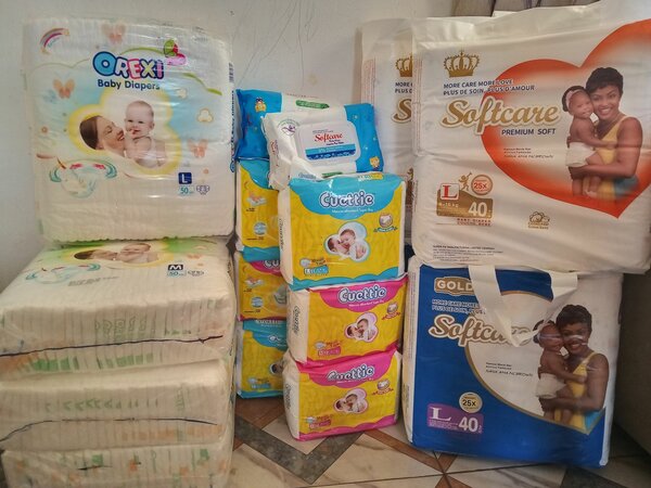 Softcare wipes and diaper, cuettie diaper and orexi baby dia