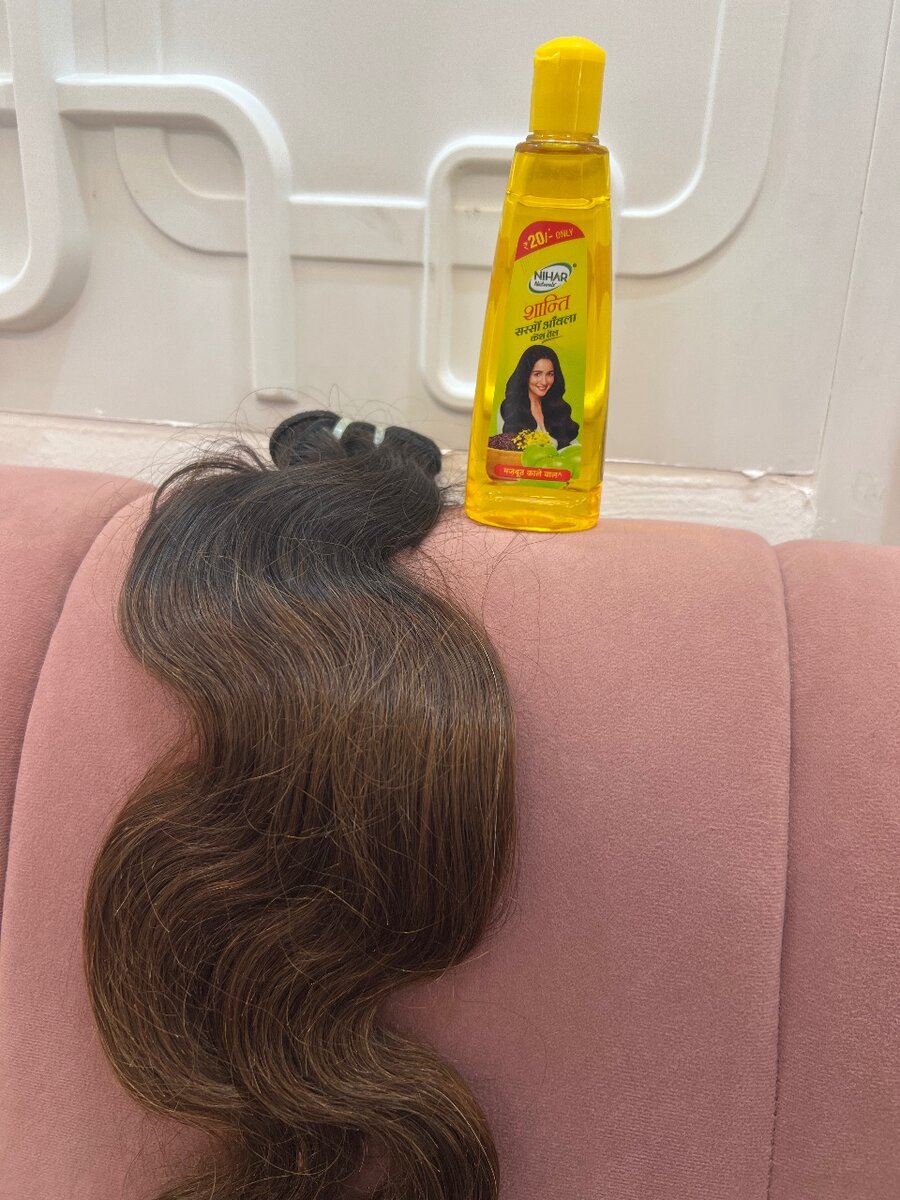 Extensions cheveux naturels bouclés