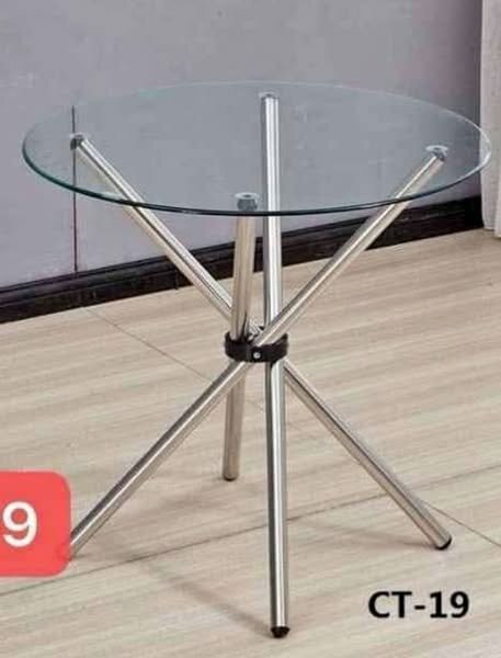 Glass and steel table
