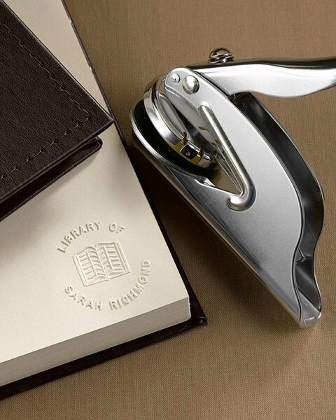 Seal embossing stamp