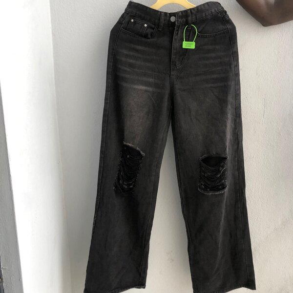 Jeans déchirés tendance