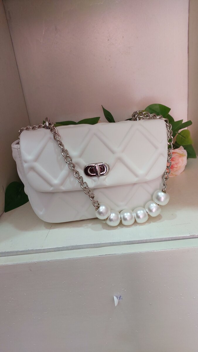 Sac à main élégant perlé