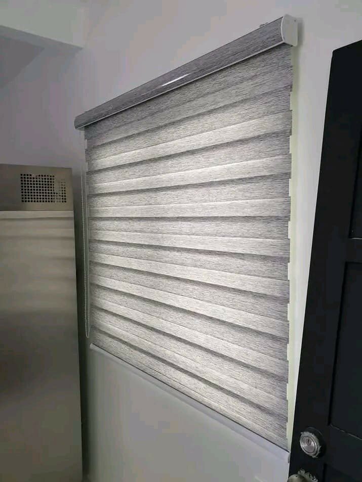 Grey colored zebra blinds