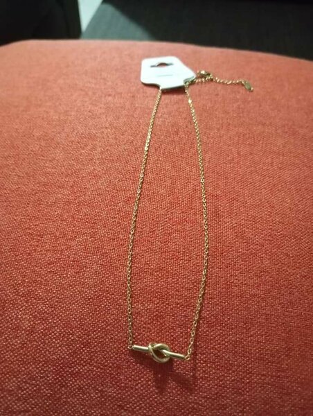 Collier Noeud Doré Élégant