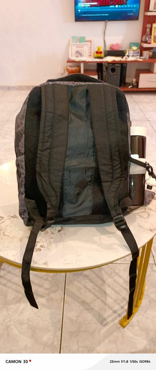 Sac à dos élégant et bouteille