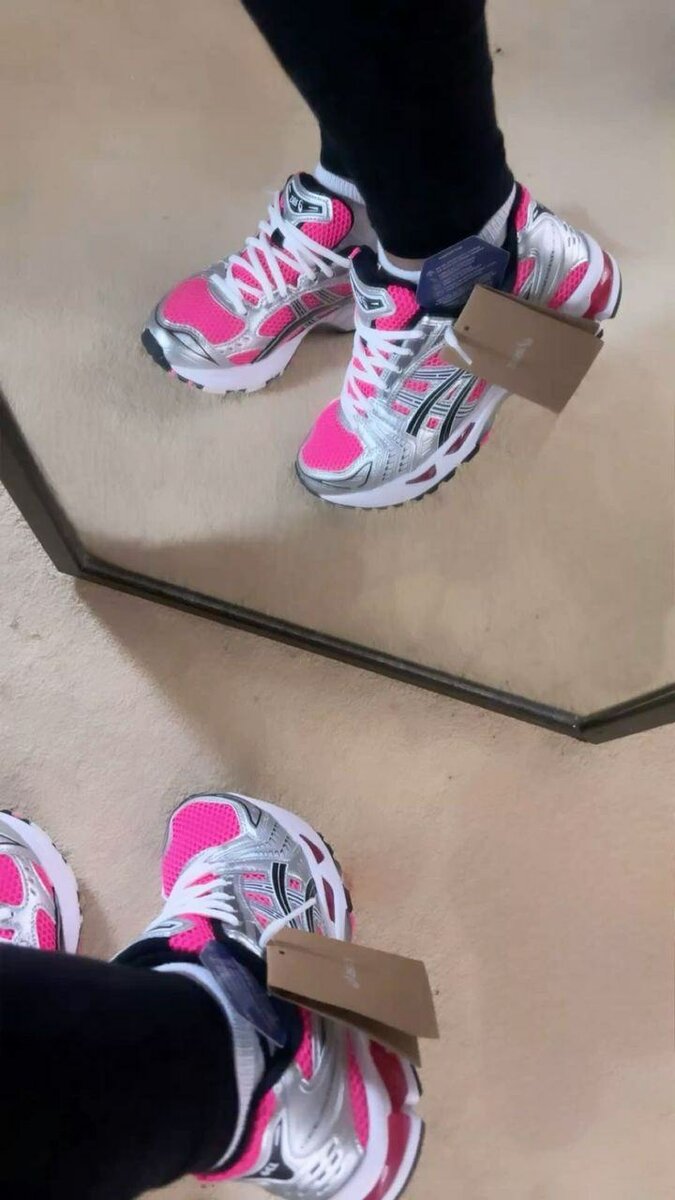 Chaussures de course roses femme