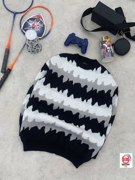 Pull en tricot noir et blanc