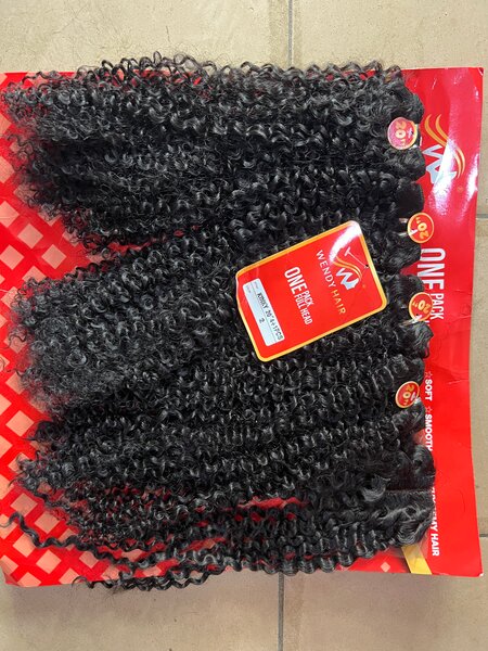 Extensions cheveux bouclés