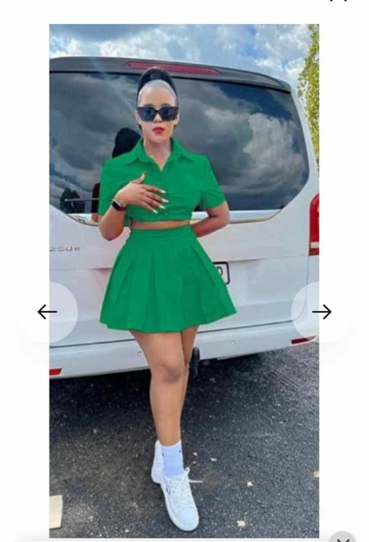 Two-piece green suit: top and skirt