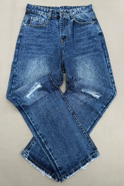 Jeans déchirés tendance