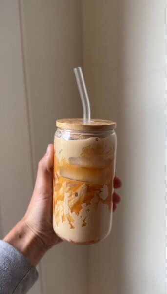Glass cup with bamboo lid and glass straw