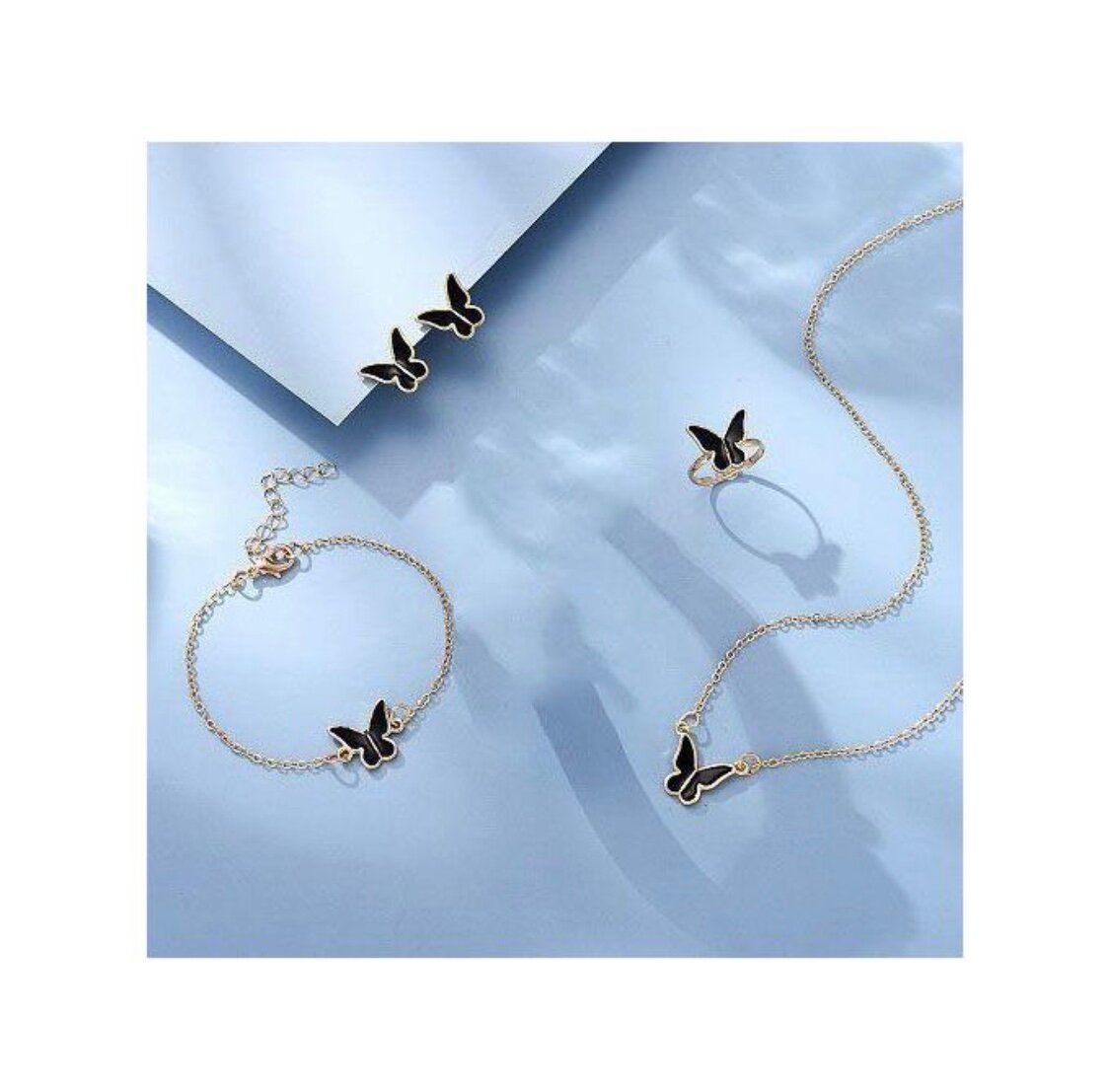 Montre et bijoux papillon élégant