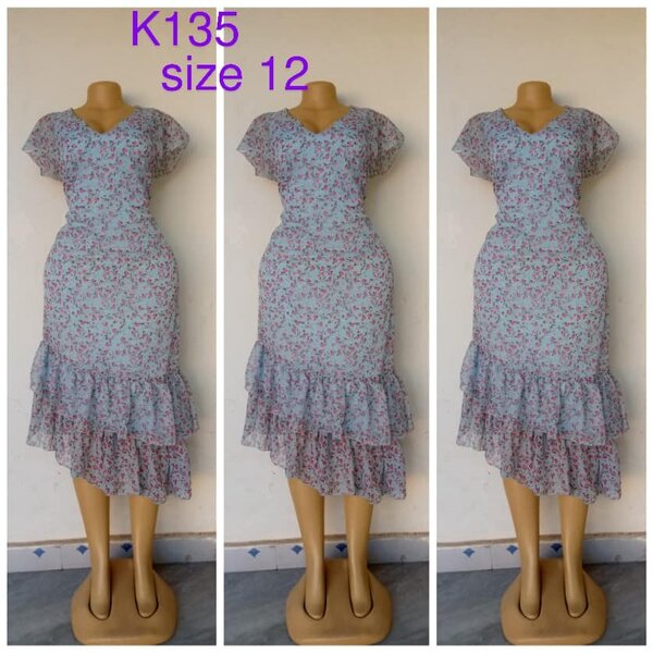 Light blue dress with small flowers, size 12