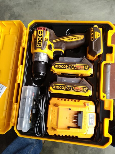 20V cordless drill with two batteries and accessories