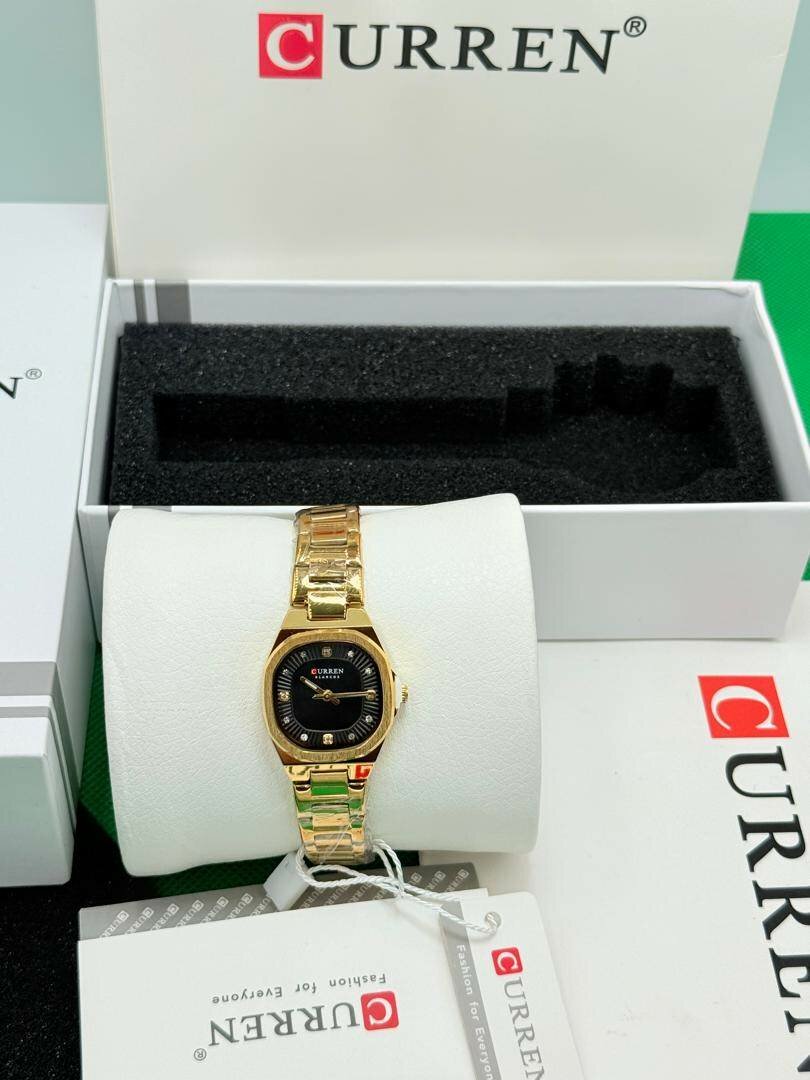 Montre CURREN dorée élégante