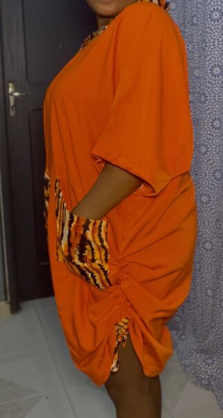 Robe ample orange à poches