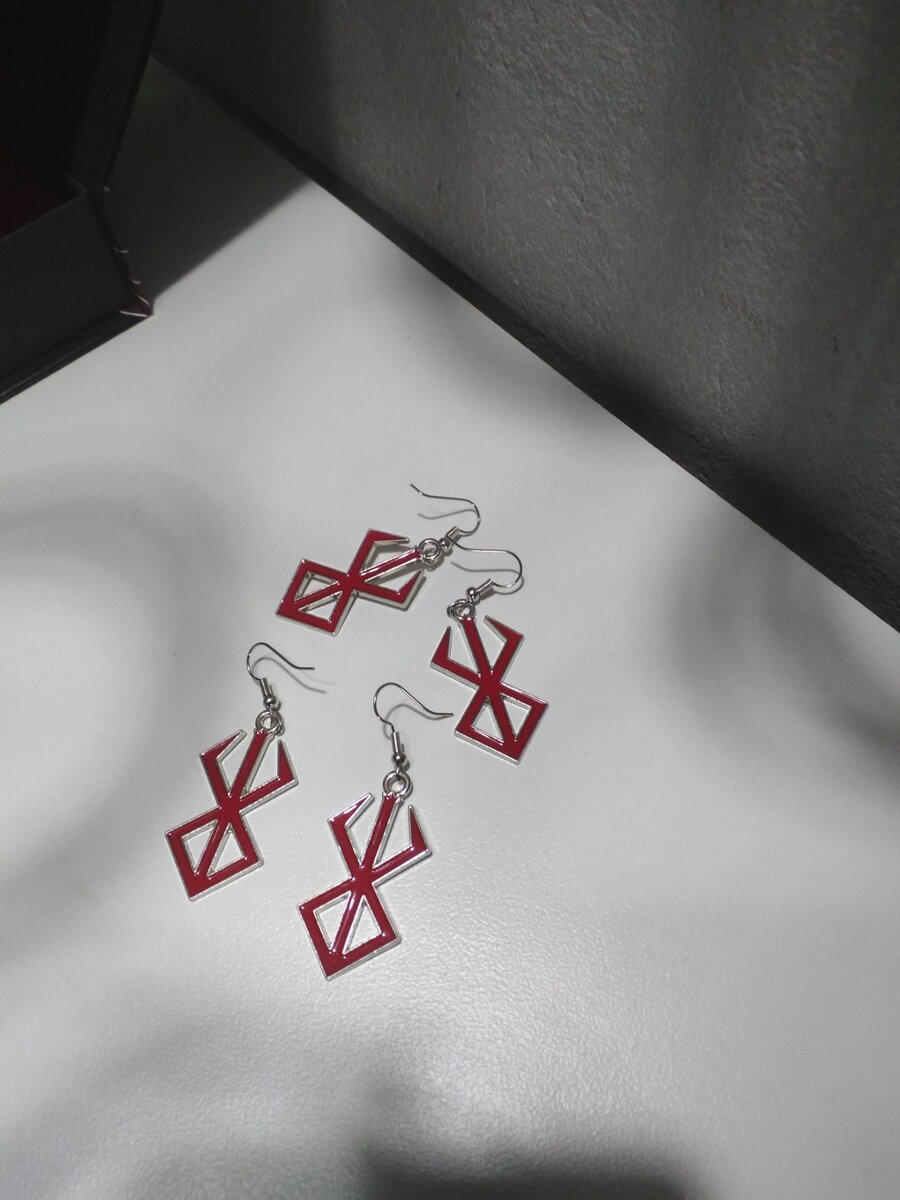 Berserk crest earrings