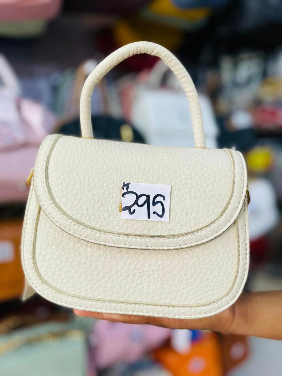 Ladies fancy hand bags beige
