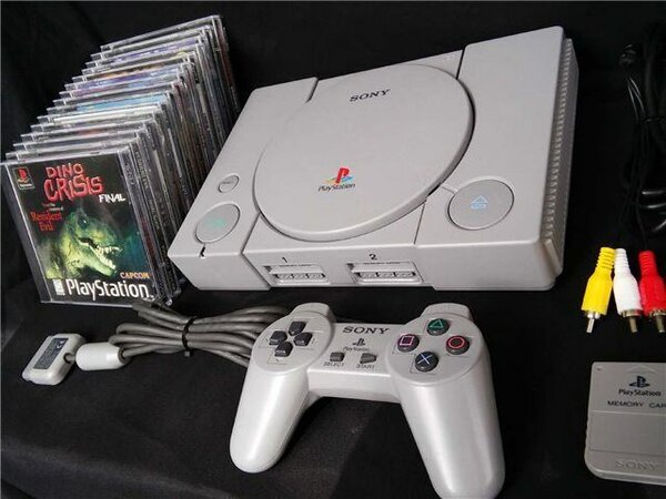 Console Sony PlayStation PS1 grise avec manette