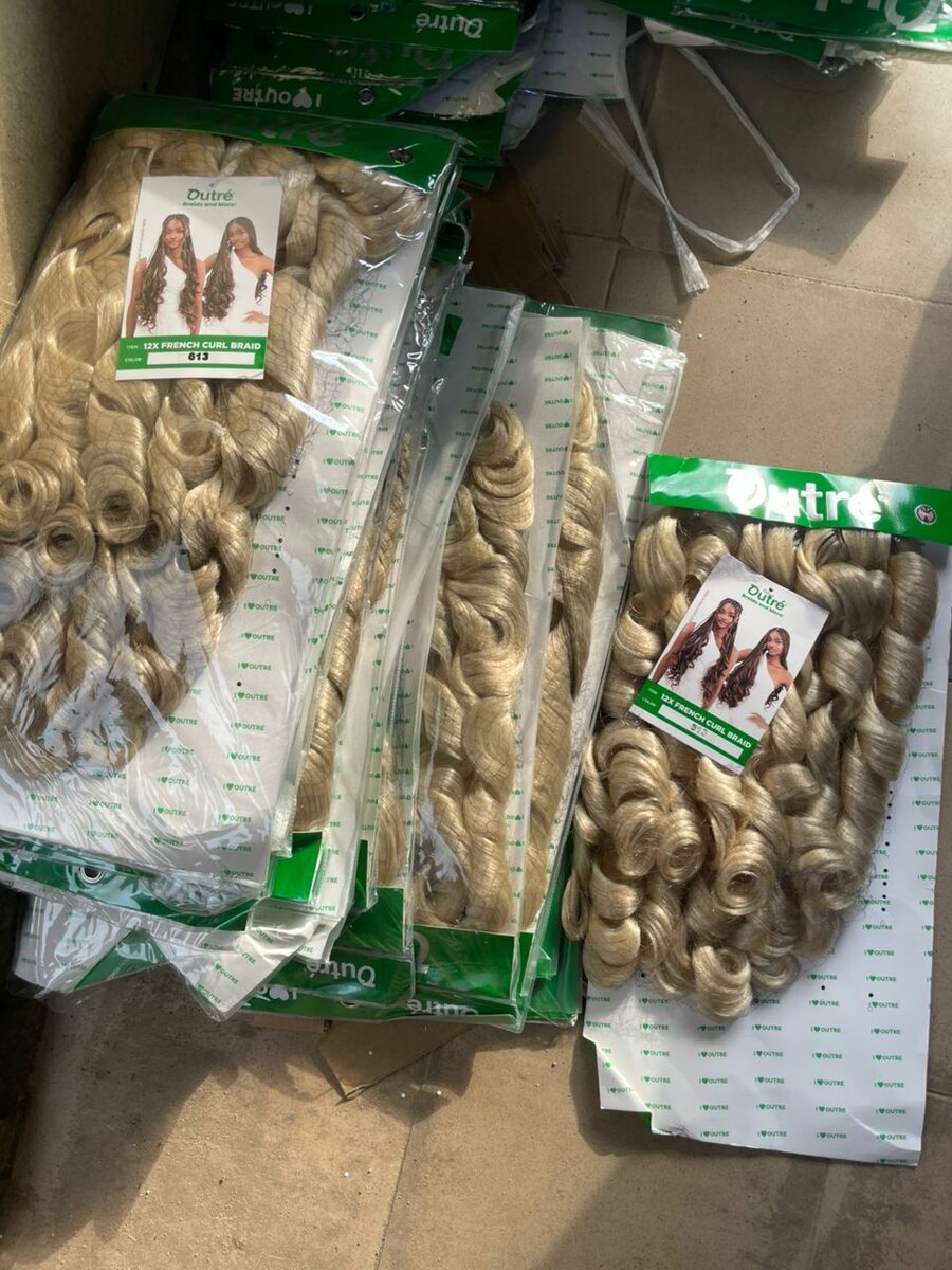 Extensions bouclés blondes